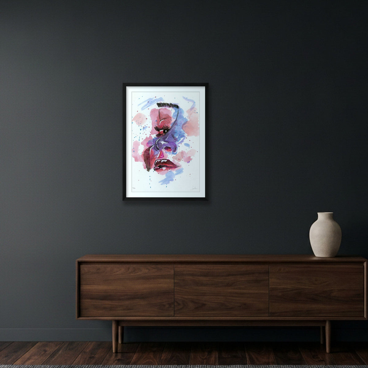 La cara · Lámina 42×59 cm con marco negro
